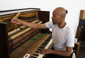 Art Terry tuning the pianola